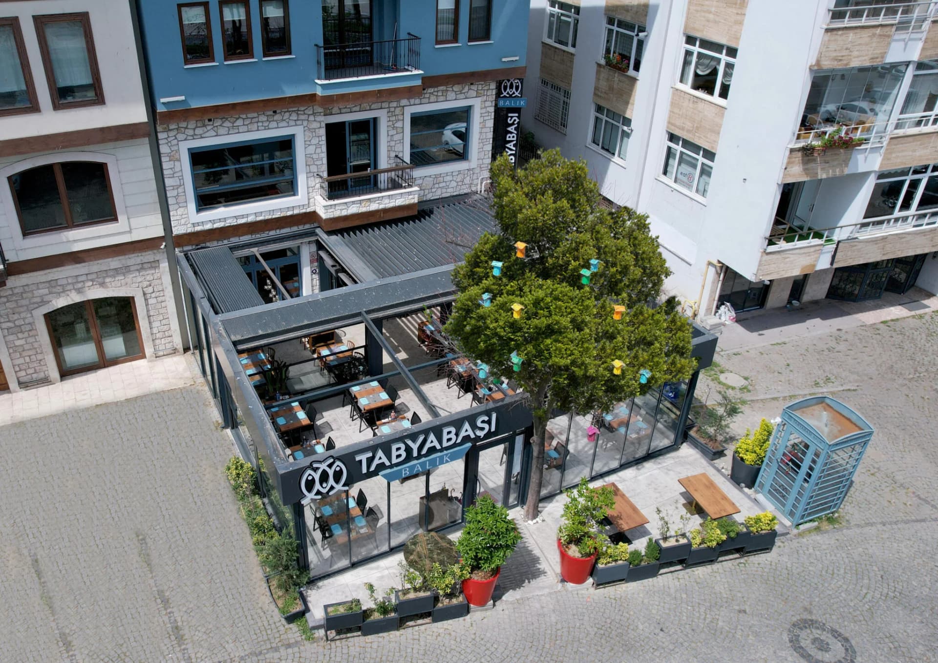 Tabya Restaurant — aerial view of glass-enclosed dining