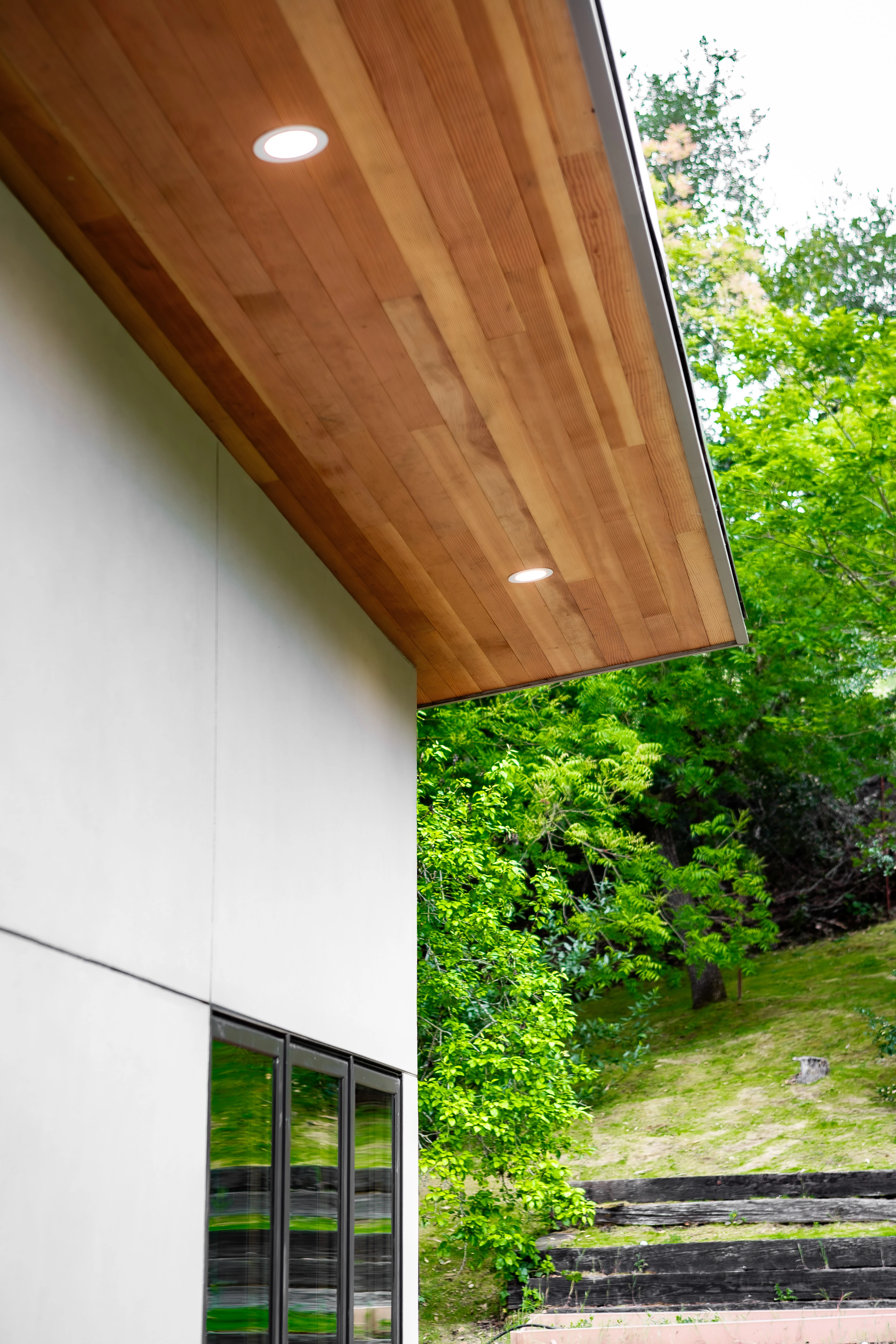 Looking up — roof, sky, hillside